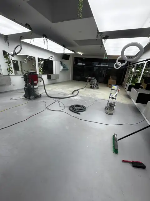 Half-ground floor showing previous epoxy coating