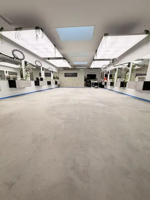 Vacuumed and masked concrete floor ready for coating