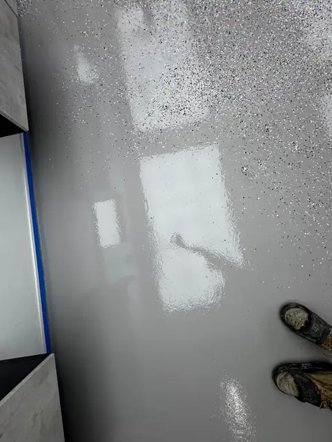 Epoxy base coat with flake broadcast in progress
