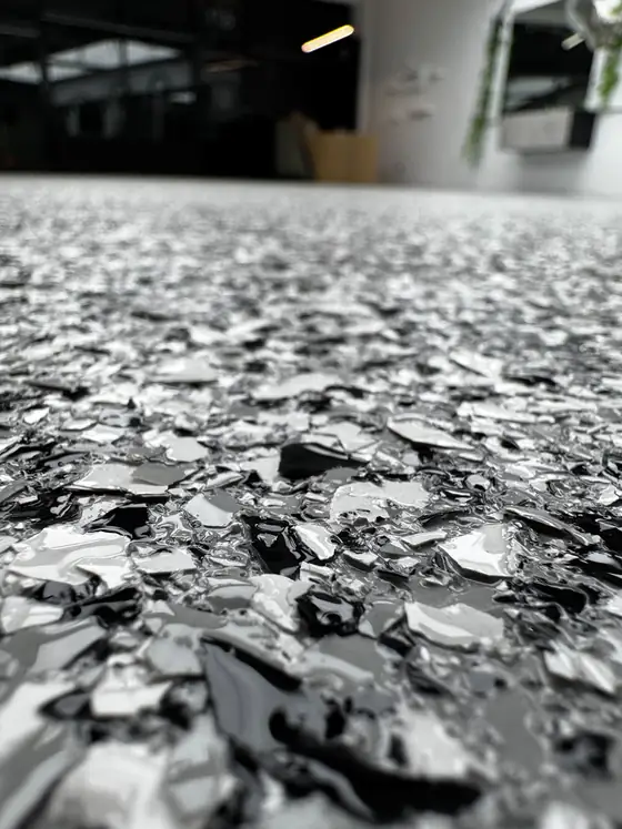 Glossy full-broadcast flake floor close-up
