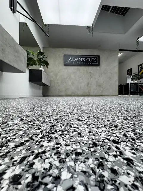 Full-broadcast flake floor, Aidan's Cuts barbershop