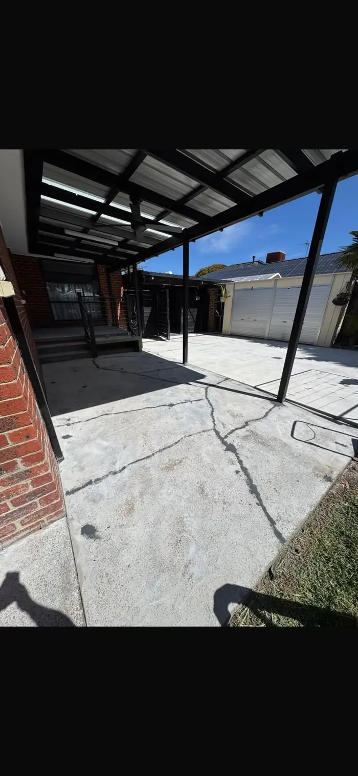 Before — cracked and weathered concrete patio