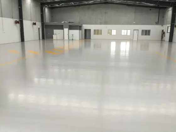 Plain coat epoxy floor in light grey, commercial space, Melbourne