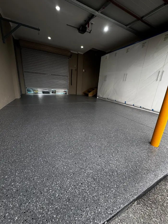 After — Basalt flake over Pipeline Grey epoxy garage, Mill Park