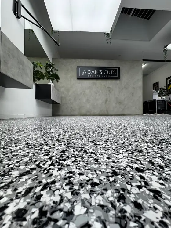 Barbershop flake floor in black, white and silver